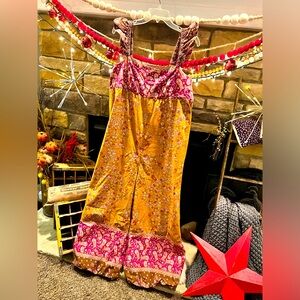 Free People Bali Albright Jumpsuit size XL. Worn 1 time. Like brand new.